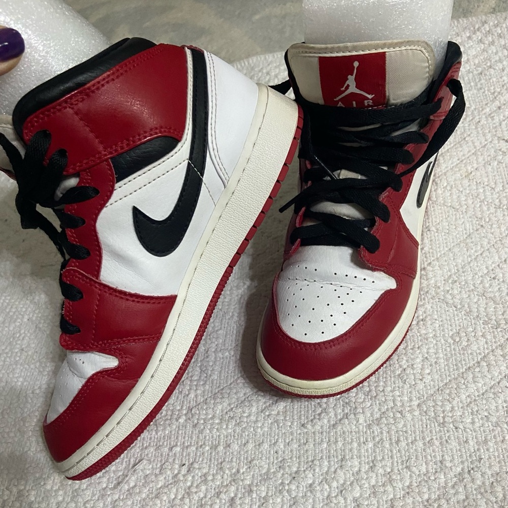 Kids red black and white Jordan’s